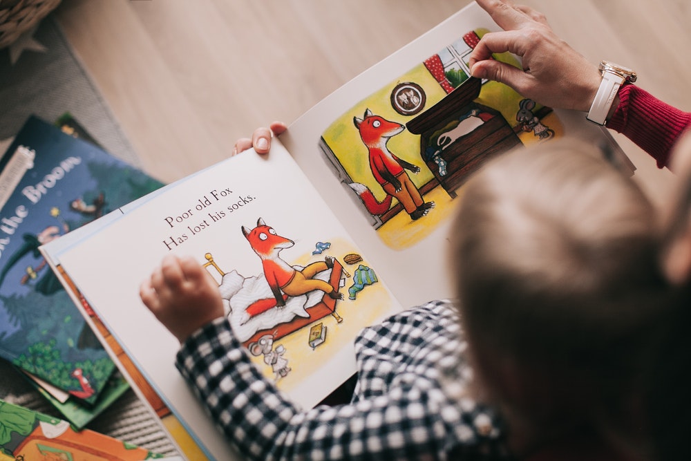 Child reading a picture book