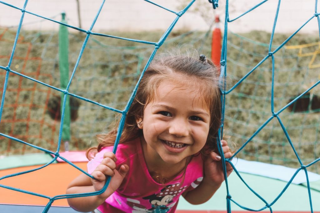 Girl smiling on a playground