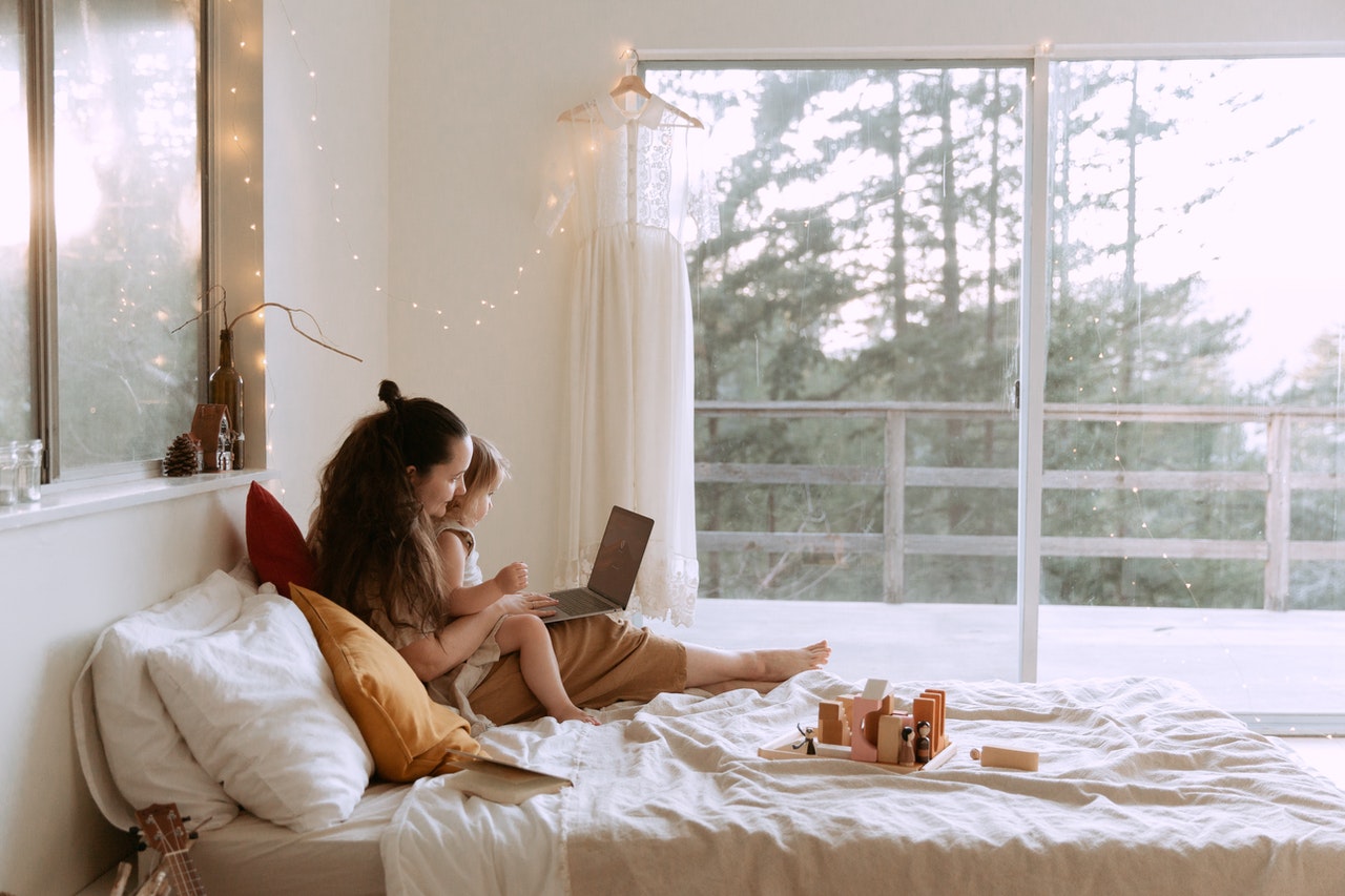 Mom and daughter in bed