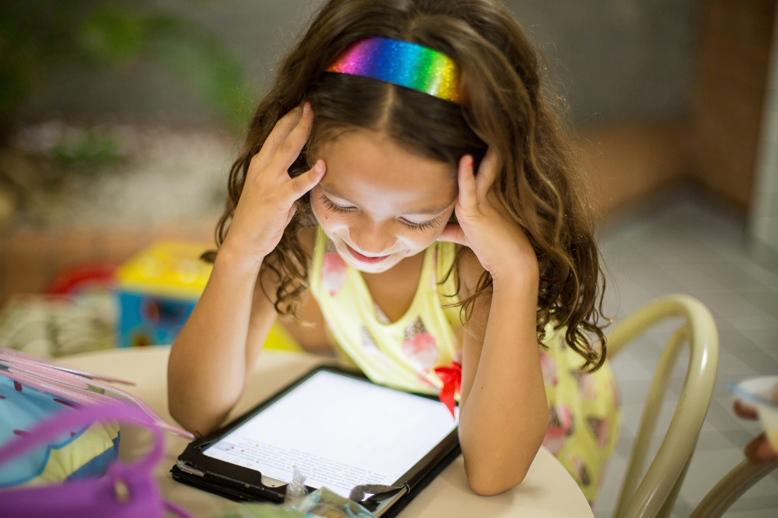 Young child looking at tablet